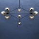 image 3 of Interiors by Premier Matte Black 21 Arm Pendant Lamp, Mid Century Sputnik Style Ceiling Light With Brown Glass Globes