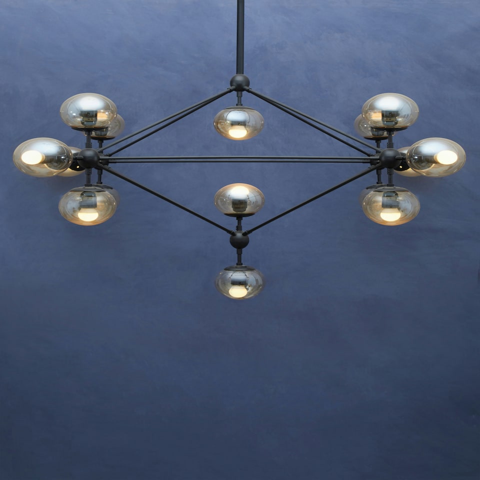 image 1 of Interiors by Premier Matte Black 21 Arm Pendant Lamp, Mid Century Sputnik Style Ceiling Light With Brown Glass Globes
