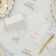 image 2 of Gold Foiled Scalloped Edge Bow White Paper Place Cards - Pack of 8