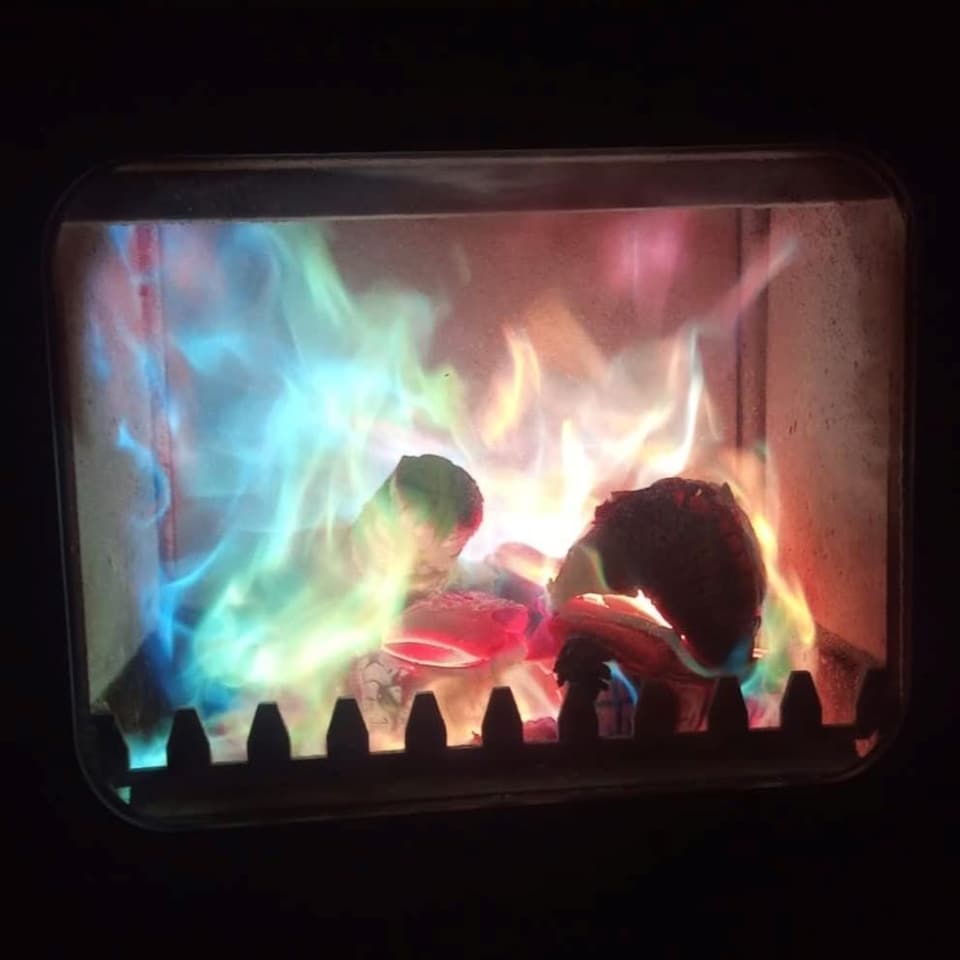 image 1 of Polaris Colour Changing Flame Burning Pine Cones 250g