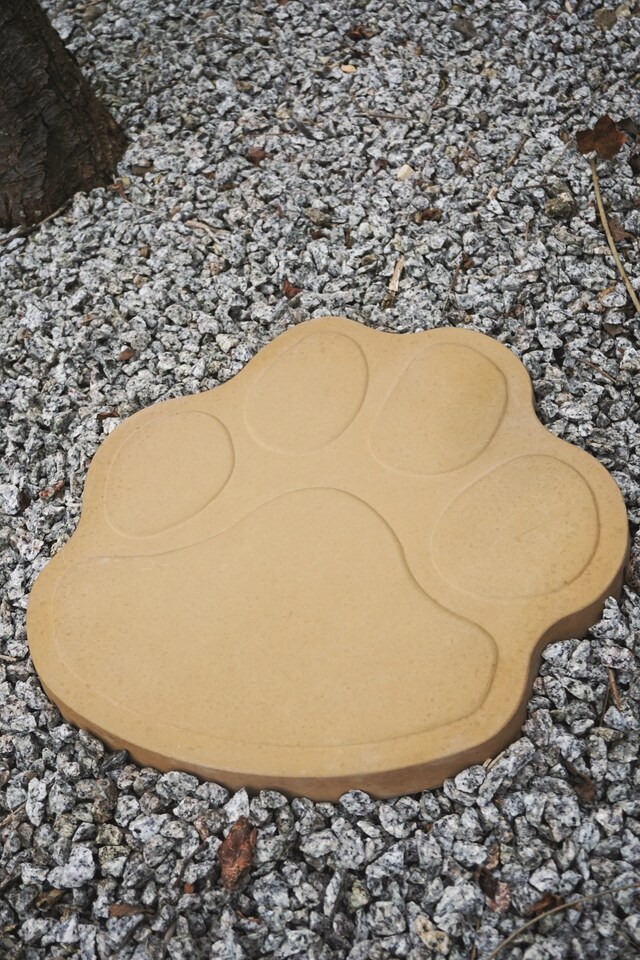 image 1 of Paw Print Shaped Stepping Stone 420mm  Barley - Full Pallet of 20 - Bowland Stone