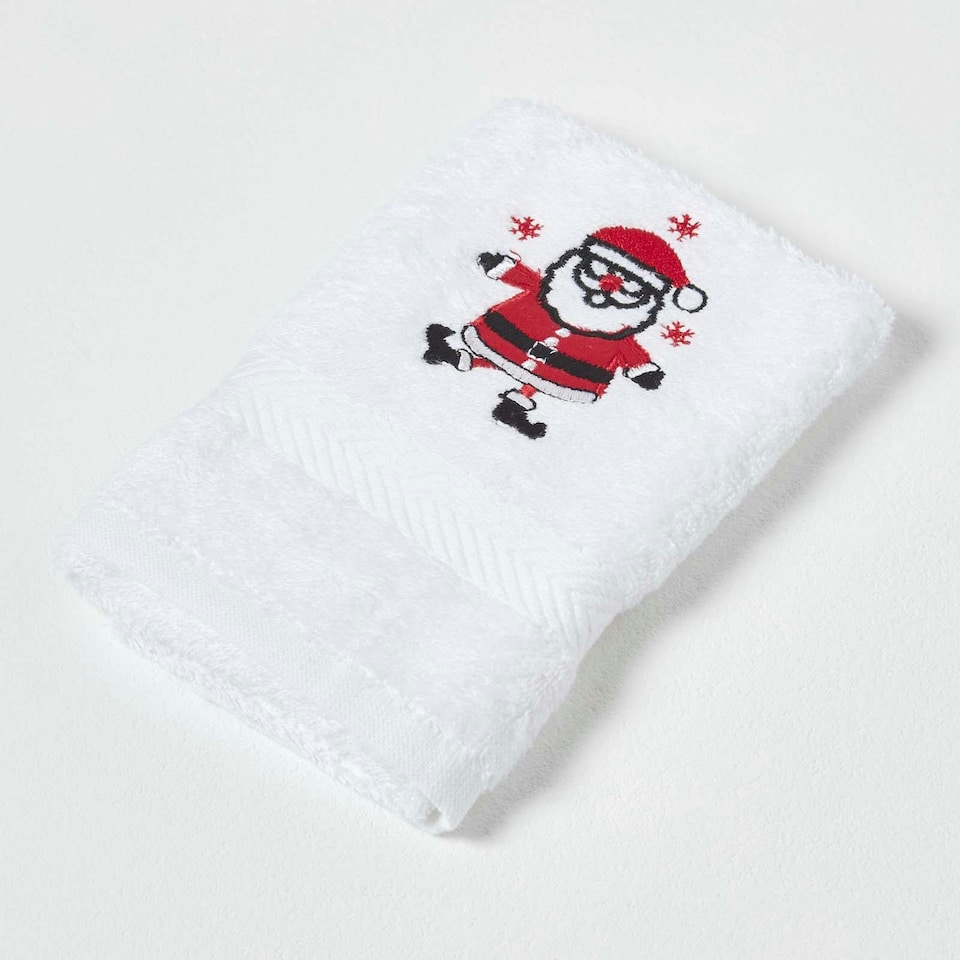 image 1 of Homescapes Santa Embroidered Cotton Small Christmas Towel | White | Hand towel