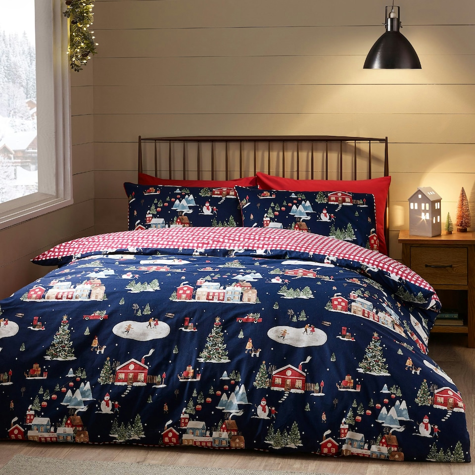 image 1 of Catherine Lansfield Christmas Ski Village Reversible Duvet Cover Set Navy Blue Blue | Navy Blue | Super King