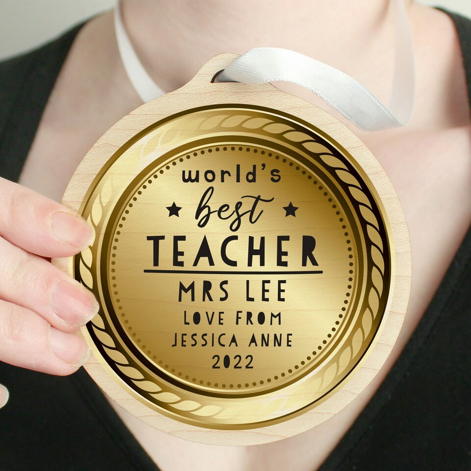 image 1 of Personalised WorldÂ’s Best Teacher Round Wooden Medal