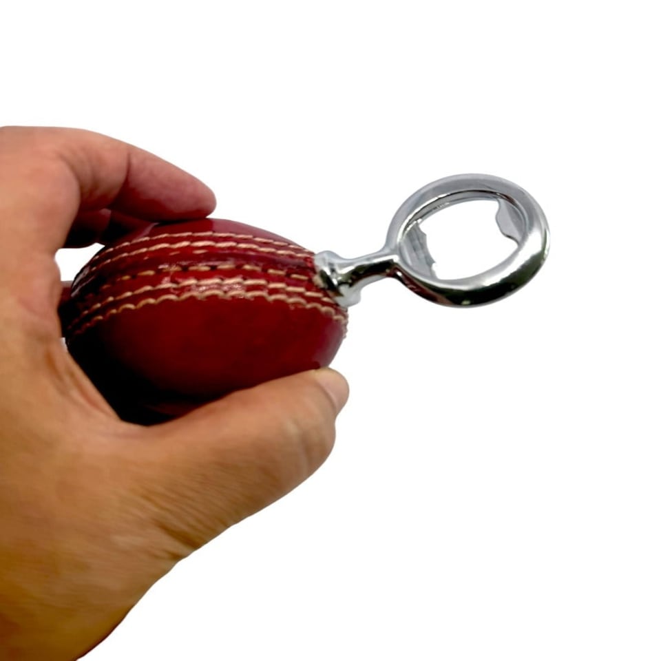 image 1 of CRICKET-GIFTS - Real Cricket Ball Bottle Opener | Made from Genuine Leather | For Cricket Fans | Unique Bar Accessory | Handmade and Designed in the UK
