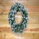 image 5 of 55cm Premier Christmas Snow Tipped Green Pine PVC Door Wreath