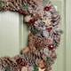 image 3 of 50cm Frosted Hanging Christmas Wreath with Red Jingle Bells & Wooden Stars