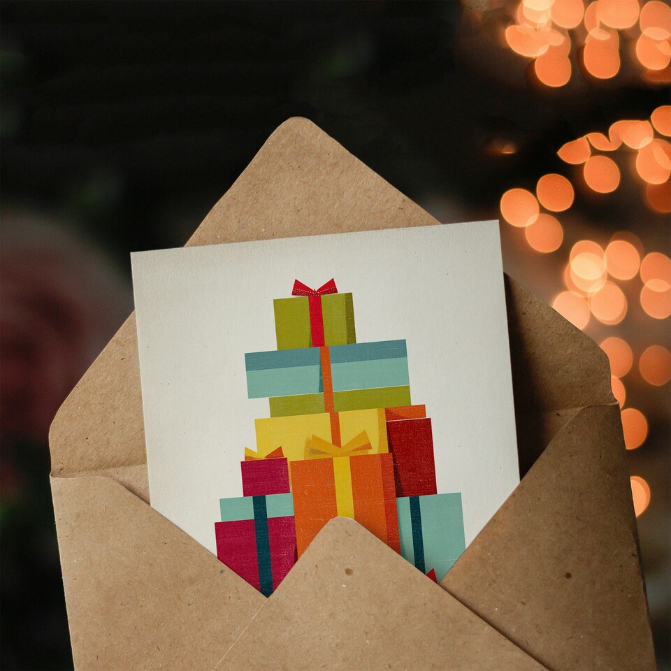 image 1 of Christmas Card Colourful Geometric Pile Of Xmas Presents