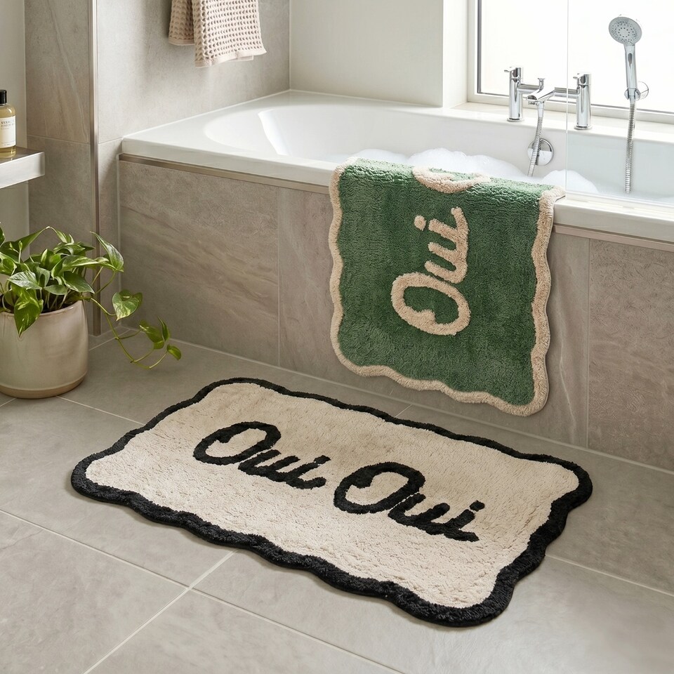 image 1 of Oui Oui Slogan Scalloped Bath Mat
