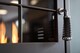 image 10 of OKO S2 Bio Ethanol Stove with Log Storage in Charcoal Grey with Tall Angled Stove Pipe