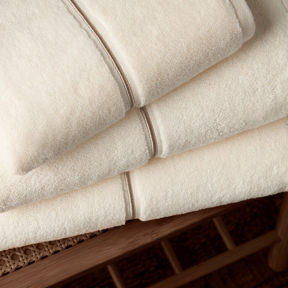 image 1 of Bianca Zero Twist Satin Stitch Cotton Bath Sheet | Cream | Bath sheet