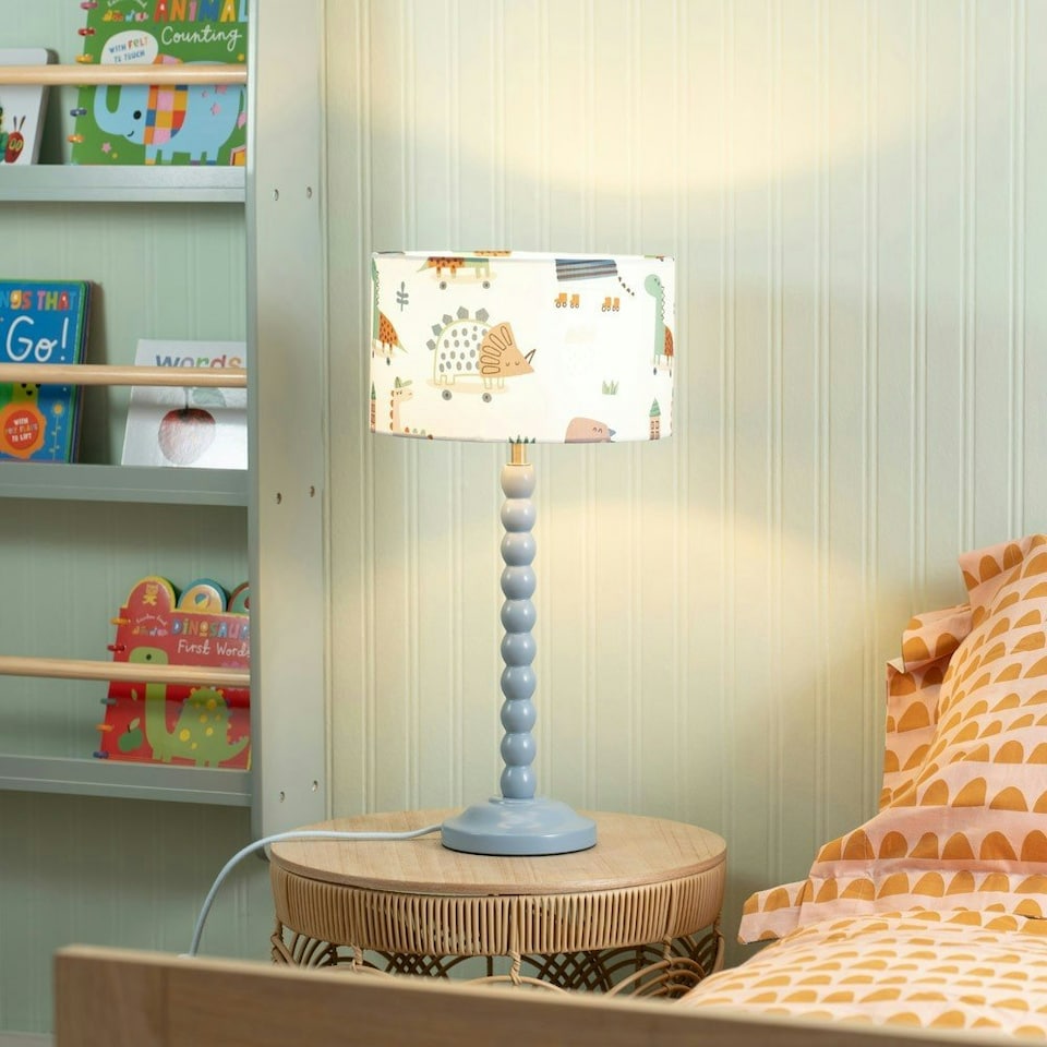 image 1 of ValueLights Bobbles Powder Blue Bobbin Table Lamp with Cartoon Dino Shade & LED Bulb