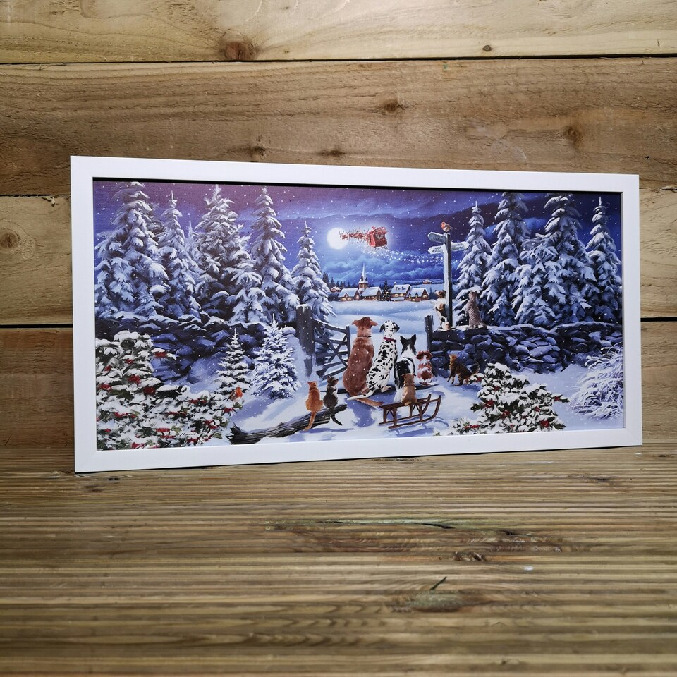 image 1 of 30cm x 60cm Battery Operated Fibre Optic Winter Dogs Watching Santa Sleigh Scene Touch Activated Christmas Canvas