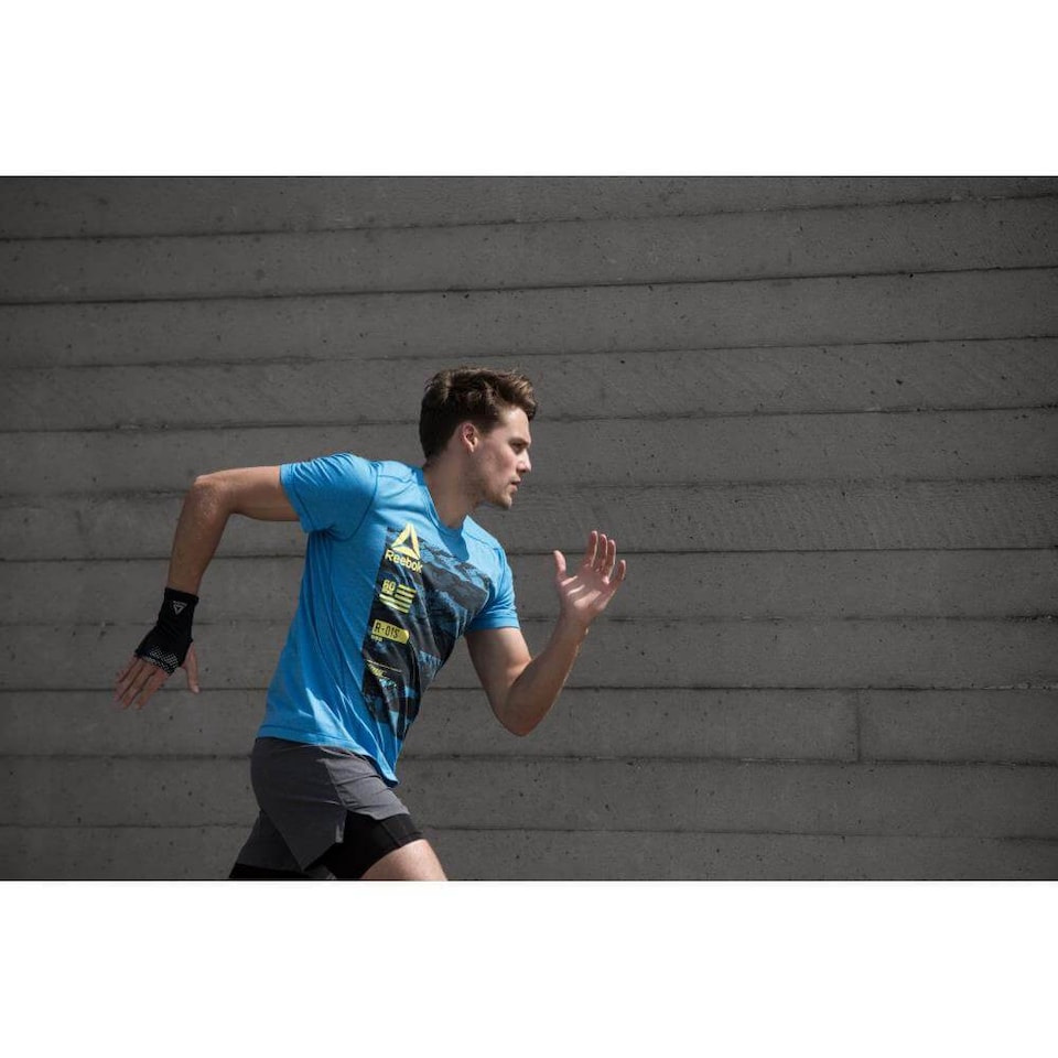 image 1 of Reebok Wrist Support — Breathable Elasticated Wrist Brace with Silicone Grip, Black, Size L | Black | BLACK | L