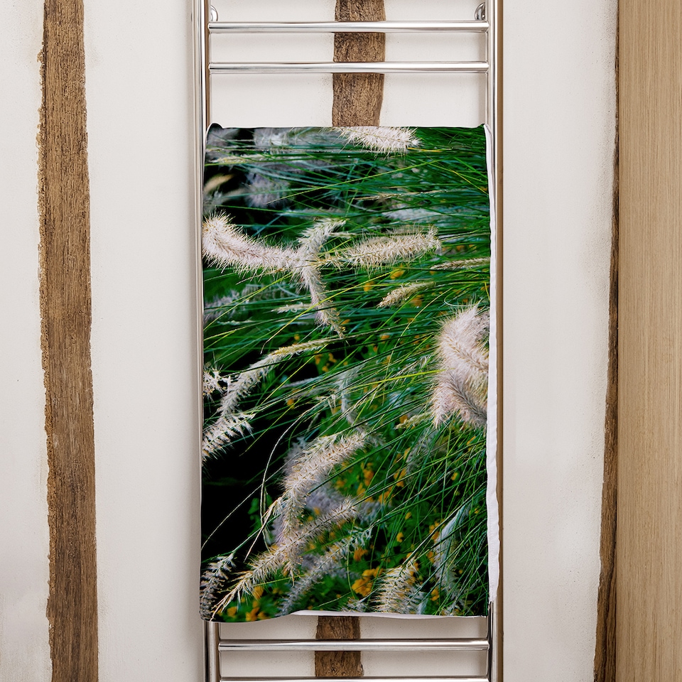 image 1 of decorative cat tail grass growing along a walkway Designer Bath Towel | Multi
