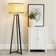 image 1 of ValueLights Lottie Black Wood Tripod Floor Lamp with Natural Cane Drum Shade