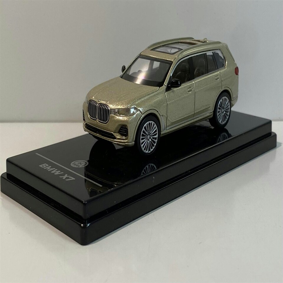image 1 of BMW X7 Sunstone 1:64 Scale Paragon 65196R