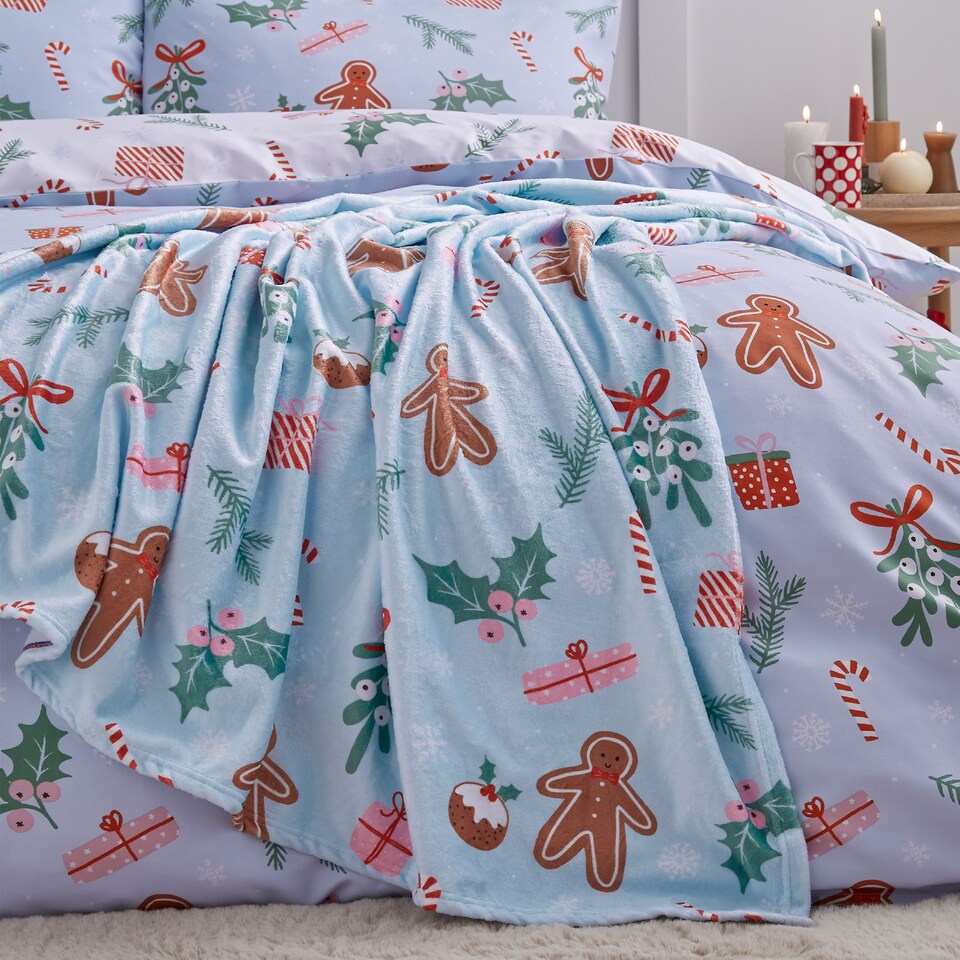 image 1 of Catherine Lansfield Christmas Gingerbread Cosy Fleece Blanket Throw