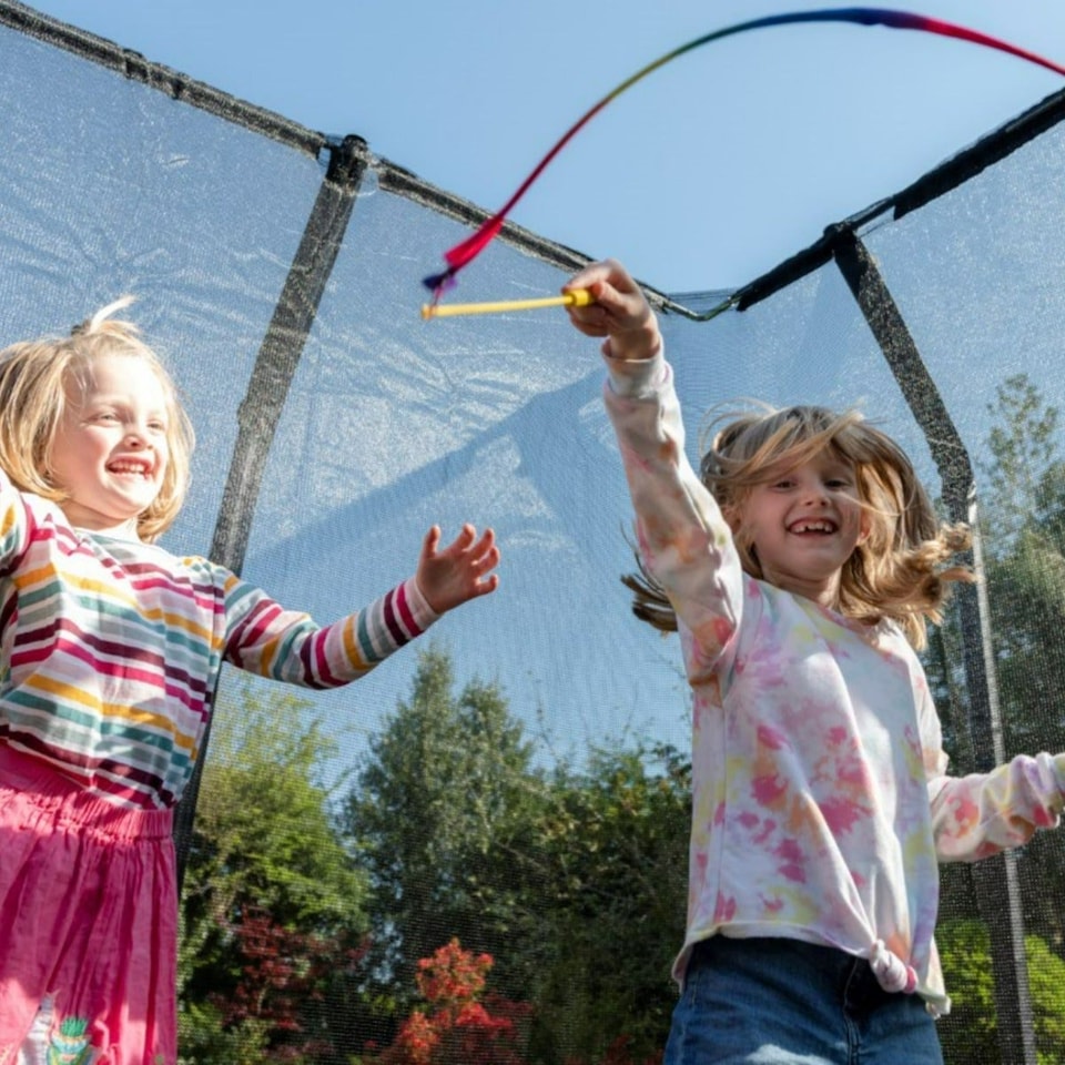 image 1 of 10ft x 7ft JumpPRO® Xcel Black Rectangular Trampoline with Enclosure.