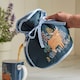 image 2 of Ulster Weavers Connie the Cow Tea Cosy - Muff Navy