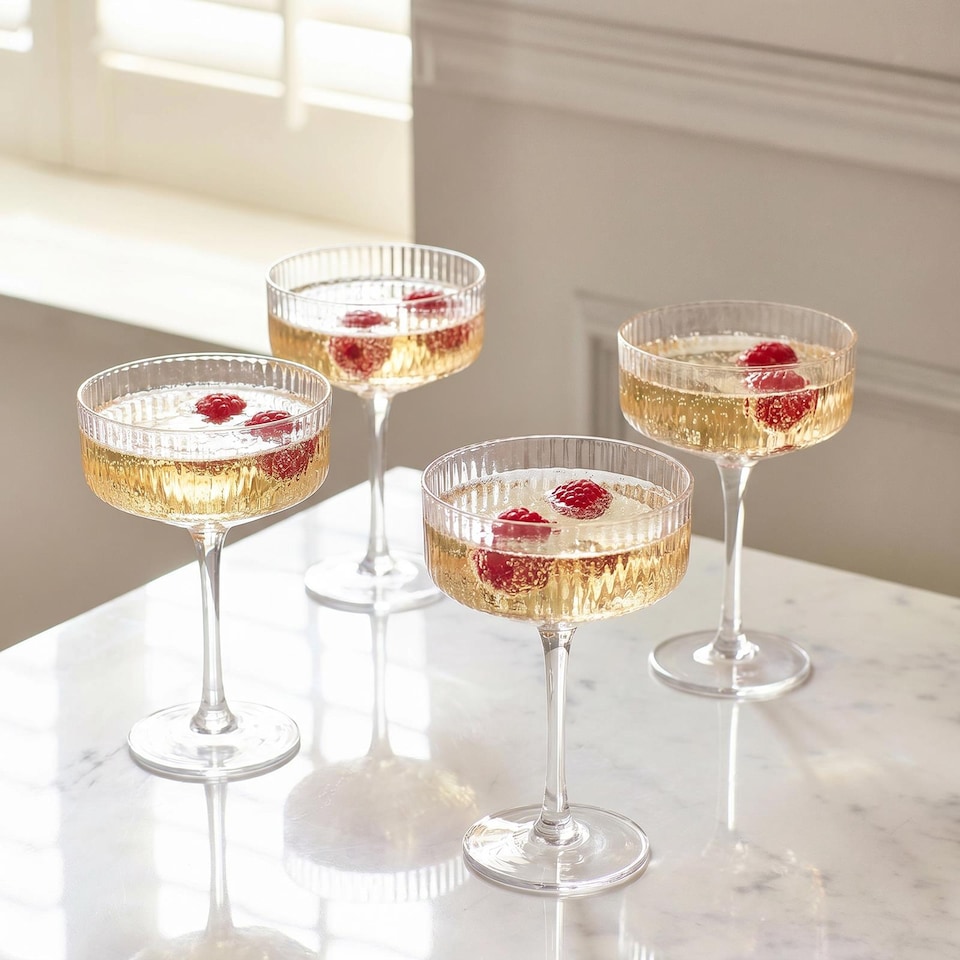 image 1 of OHS Set of 4 Ribbed Plastic Champagne Cocktail Glasses Reuseable Party Flute