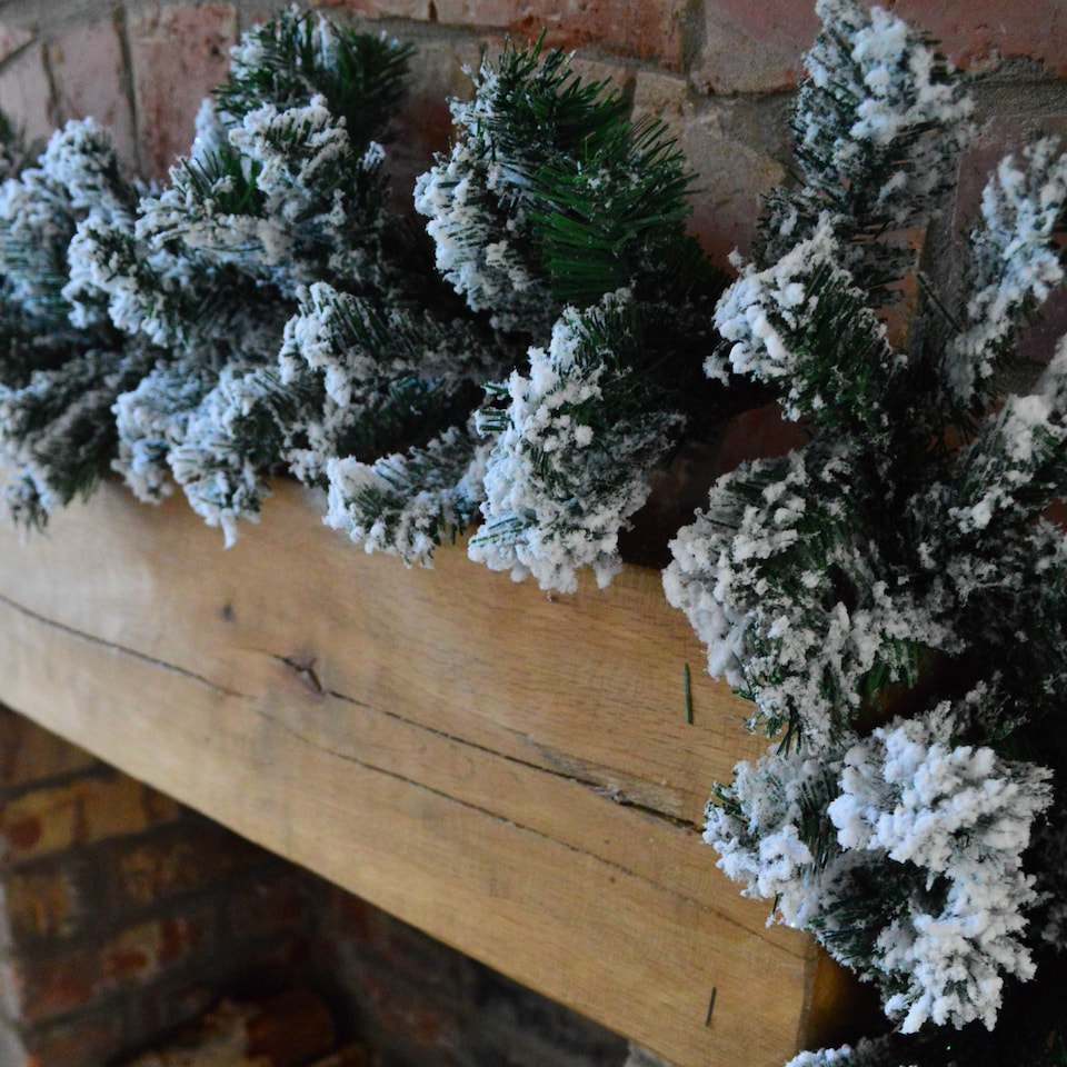 image 1 of Premier 2.7m Snow Flocked Pine Christmas Garland with Glitter Finish