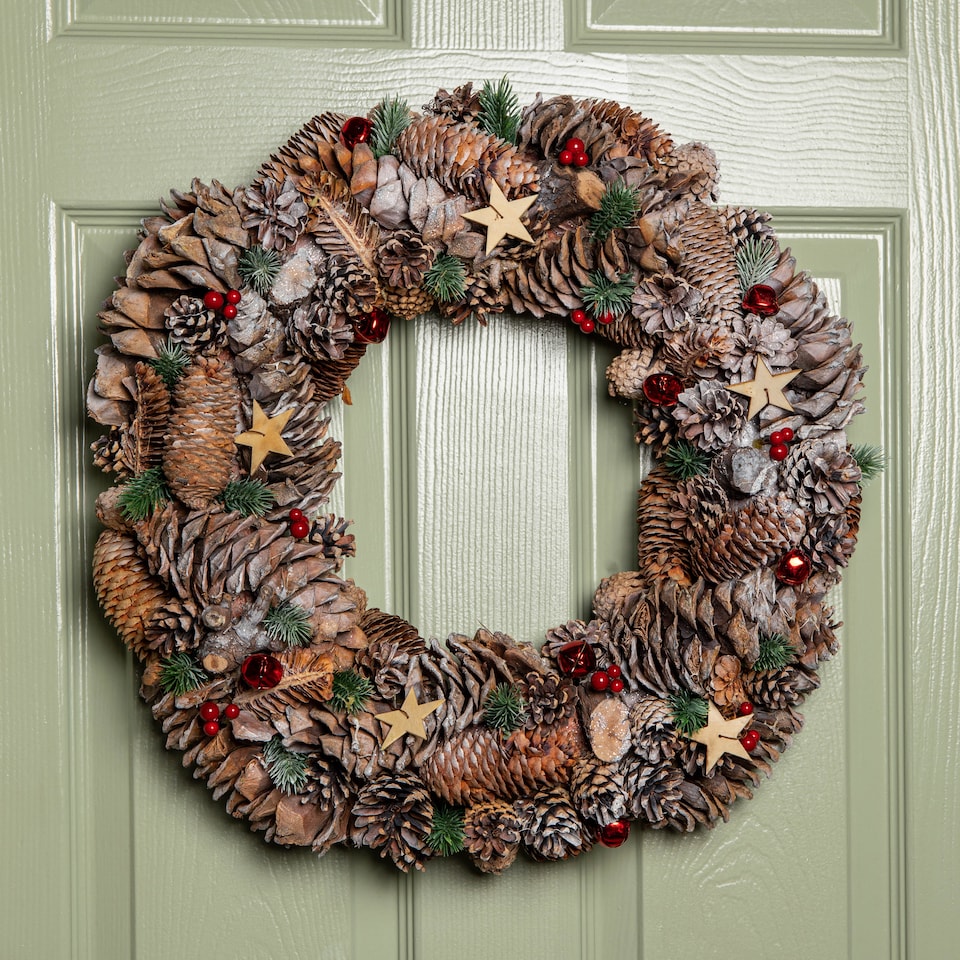 image 1 of 50cm Frosted Hanging Christmas Wreath with Red Jingle Bells & Wooden Stars