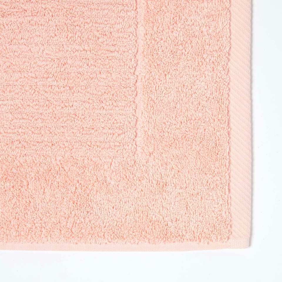 image 1 of Homescapes Imperial Plain Cotton Bath Mat - Peach | Orange | 50 x 80 cm