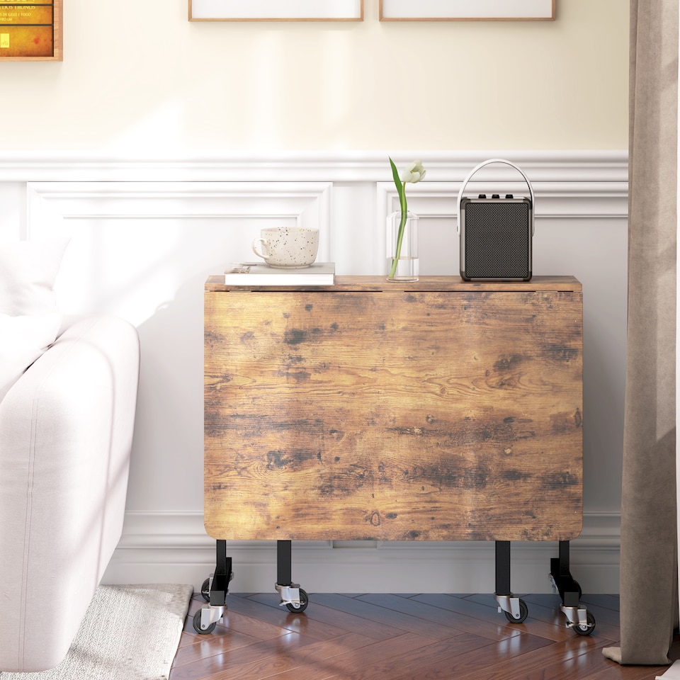 image 1 of HOMCOM Mobile Drop Leaf Table, Folding Dining Table with 6 Wheels & Brakes, Kitchen Table for Small Spaces, Rustic Brown | Brown