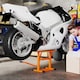 image 2 of DURHAND 150KG Steel Motorcycle Lift Rubber Platform, Crank Lift Manual Repair Clean Hoist Table Assist Off-Road Dirt Bike Stand, 27.5/39.5H cm, Orange