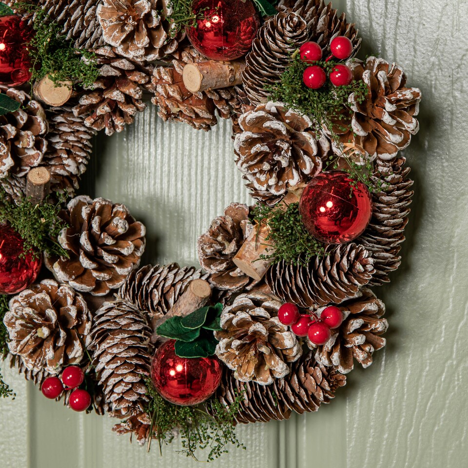 image 1 of 30cm Hanging Christmas YuleFest Wreath with Red Baubles & Snow Tipped Pine Cones