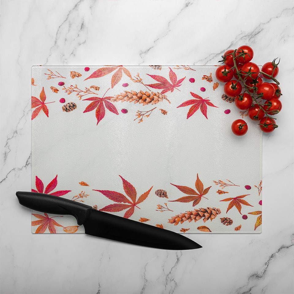 image 1 of Autumn Leaves Half Border Glass Chopping Board | Multi