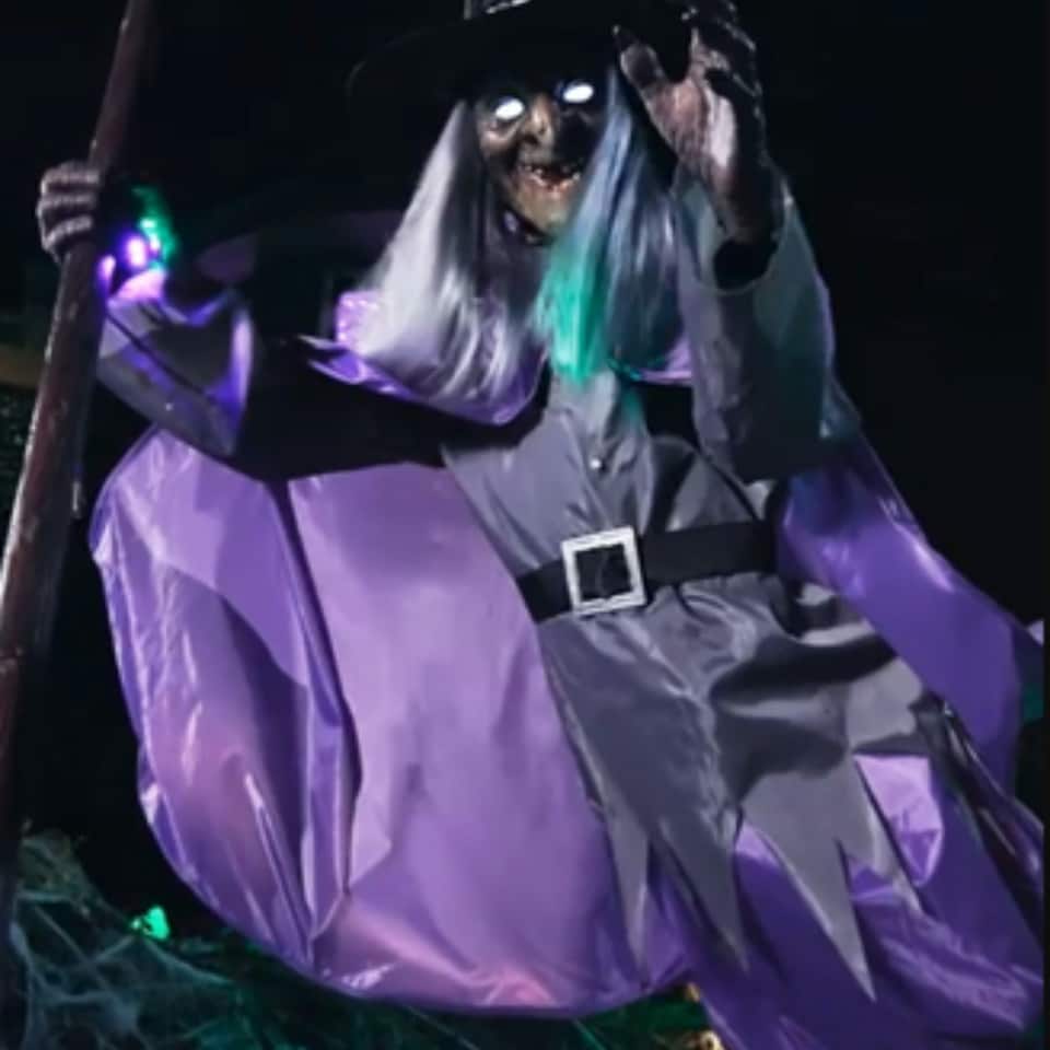 image 1 of Home Accents Holiday 12ft Giant Animated Hovering Halloween Witch with Broomstick and LEDs