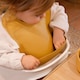 image 4 of Tiny Dining Baby Silicone Weaning Bib - Ochre | Yellow | Ochre
