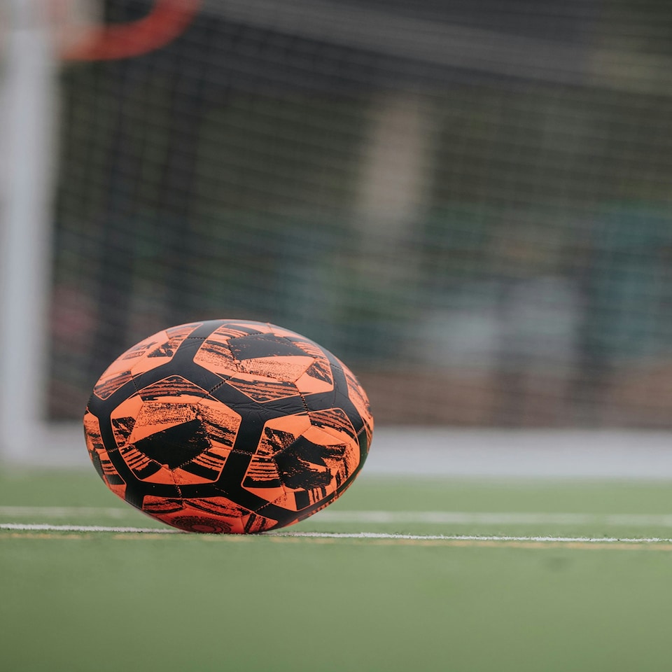 image 1 of Football Flick Size 4 Football – Training and Match Ball – Highly Durable with Shape Retention - Unique Orange and Black Design