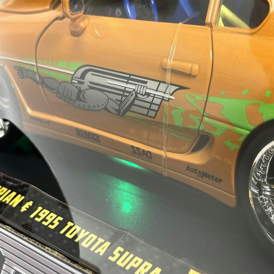 image 1 of Fast and Furious 1995 Toyota Supra Lights Up Brian Figure 1:18 Jada 31139