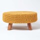 image 1 of Homescapes Mustard Large Round Cotton Knitted Footstool on Legs | Yellow | 62 x 62 x 30 cm