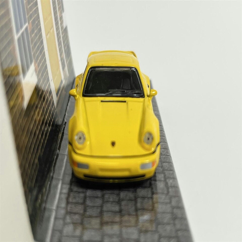 image 1 of Porsche 911 Turbo Yellow 1:64 Scale Tarmac Works Schuco T64S009YL