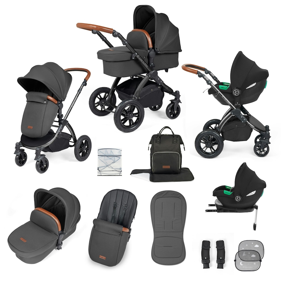 image 1 of Stomp Luxe 12pc Travel System with Cirrus i-Size Car Seat & ISOFIX Base, Carrycot, Reversible Seat, Rain Cover & More (Black/Charcoal Grey/Tan)