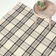 image 1 of Homescapes Logan Black and White Tartan Check Non-Slip 100% Wool Rug - 70 x 120 cm Black | 70 x 120 cm