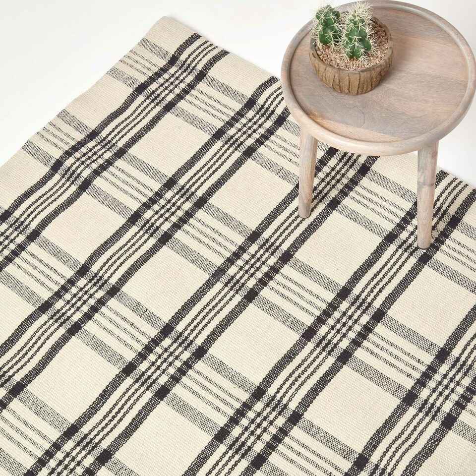 image 1 of Homescapes Logan Black and White Tartan Check Non-Slip 100% Wool Rug - 70 x 120 cm Black | 70 x 120 cm
