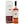 Dark amber with coppery highlights and a sherry-warmed, mahogany glow
