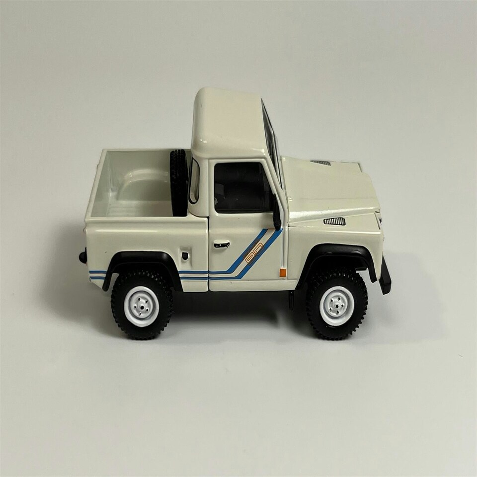 image 1 of Land Rover Defender 90 Pick Up White 1:64 Scale Mini GT MGT00338L