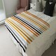 image 4 of striped pattern, orange black gray beige and brown (Blanket)