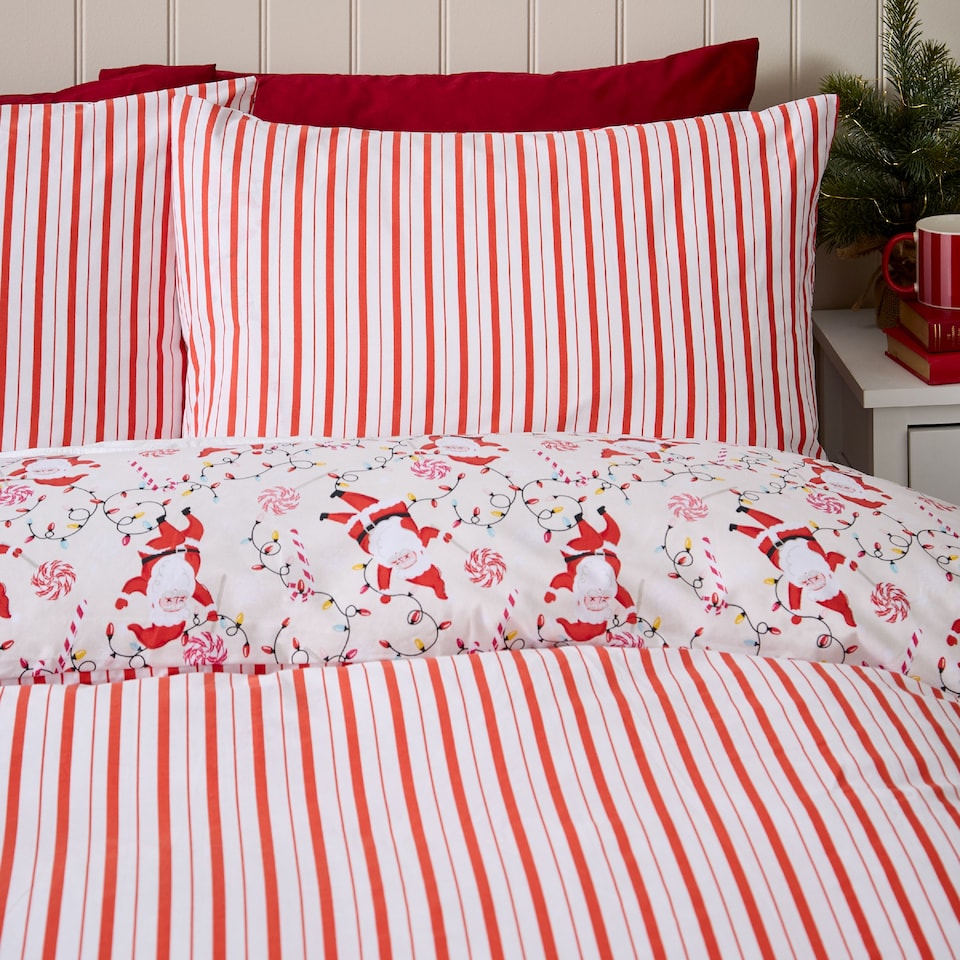 image 1 of Catherine Lansfield Christmas Santas Reversible Duvet Cover Set