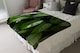 image 4 of Closeup of beautiful glossy green leaves Designer Blanket | Multi