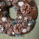 image 3 of 30cm Frosted Hanging Christmas Wreath with Pine Cones & Wooden Stars