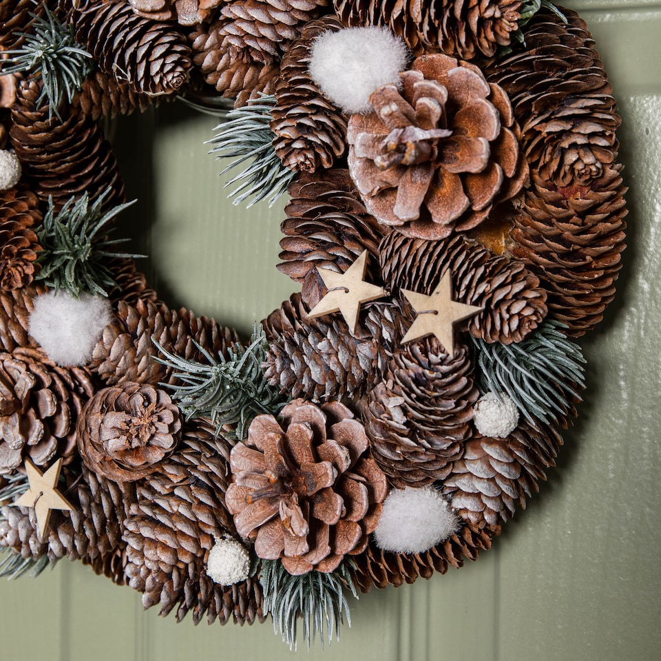 image 1 of 30cm Frosted Hanging Christmas Wreath with Pine Cones & Wooden Stars