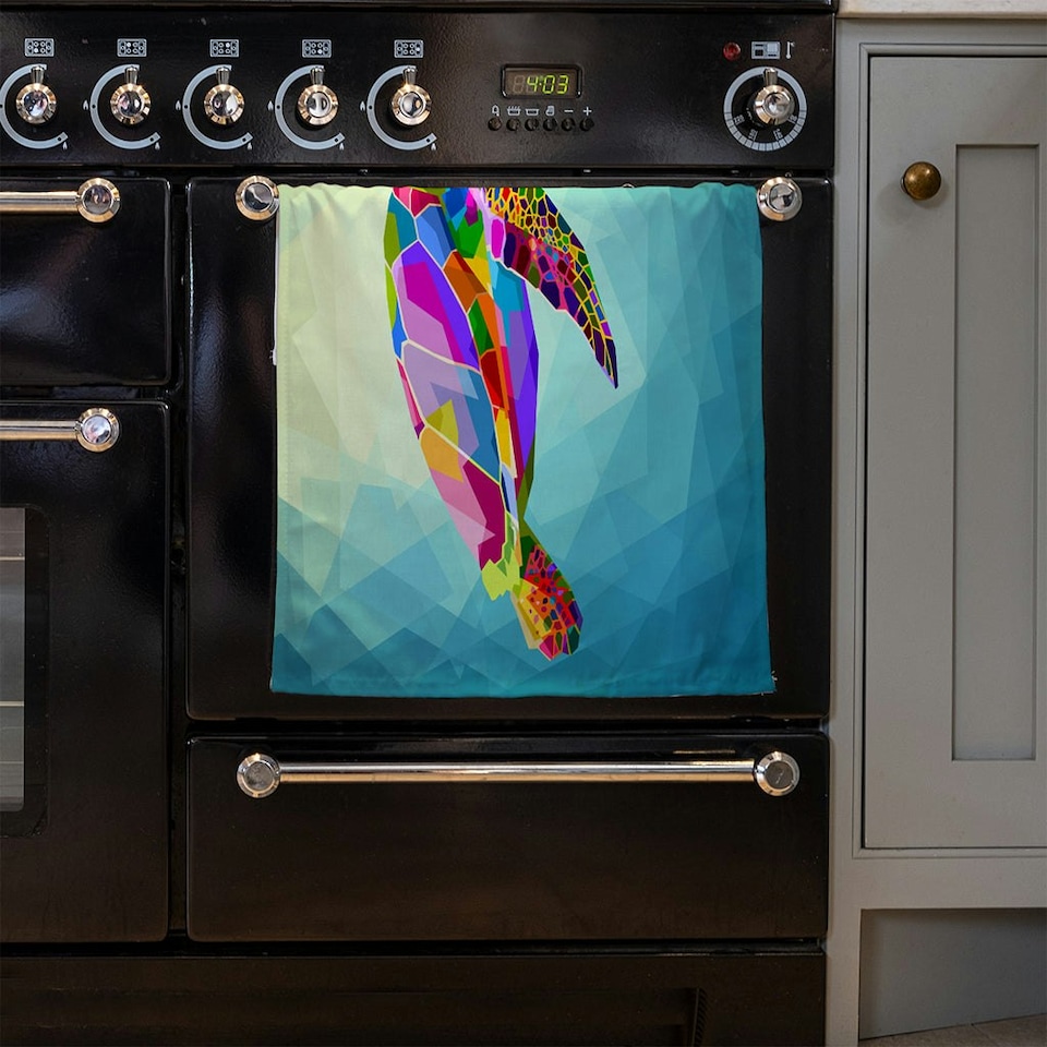 image 1 of colorful turtle floating underwater in the geometric blue water ocean (Kitchen Towel)