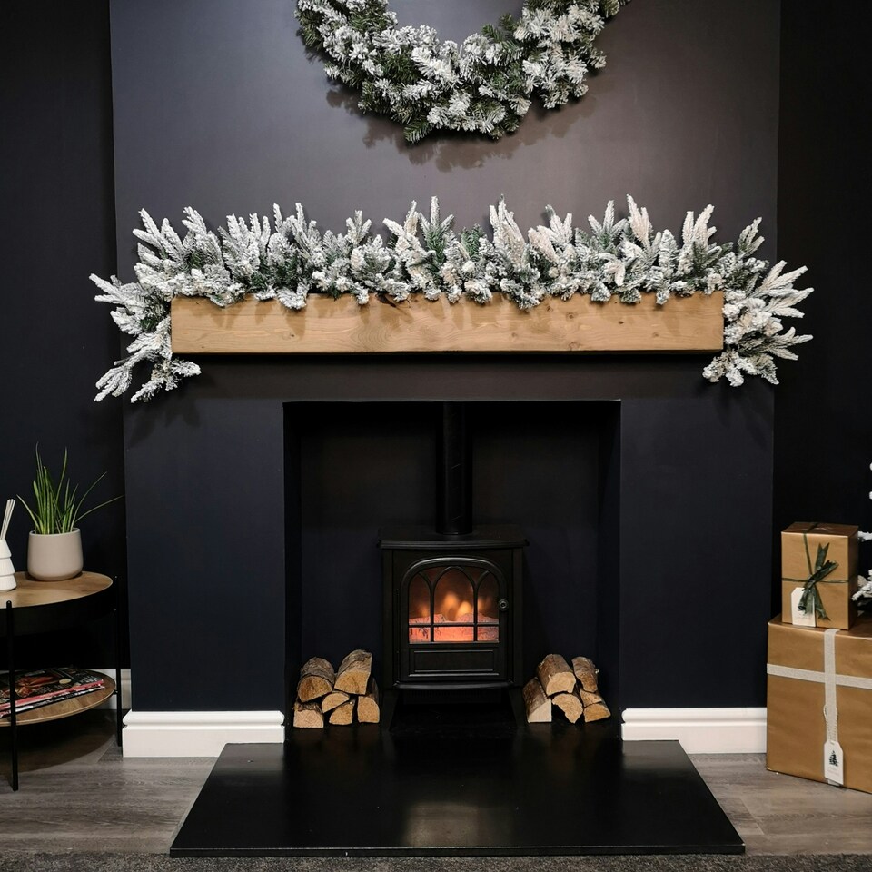 image 1 of 1.8m Snow Flocked Lapland Christmas Garland with 150 Tips